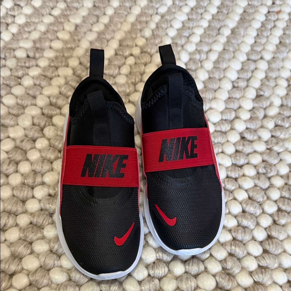 Nike Kids Slip-On Sneakers in Black and Red with White Sole